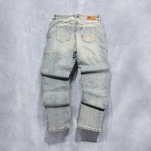Light blue Parasuco denim jeans with a straight leg fit